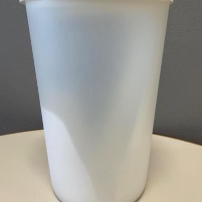 Kitchen utensils and Tupperware bagel keeper