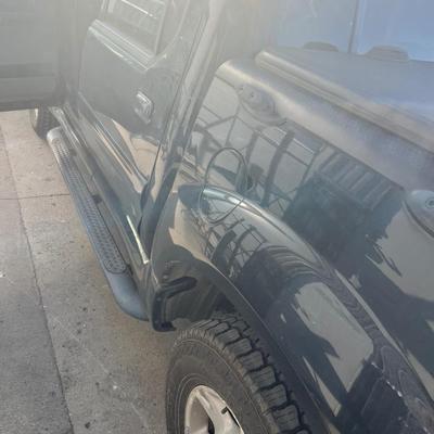 Sale Photo Thumbnail #11: 2004 Explorer Sports trac pick up, 269k Miles.  This vehicle was driven from Lisbon, ND. There is a short period after starting where it idles high.