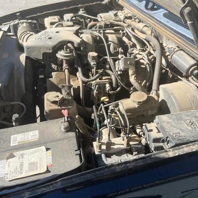 Sale Photo Thumbnail #16: 2004 Explorer Sports trac pick up, 269k Miles.  This vehicle was driven from Lisbon, ND. There is a short period after starting where it idles high.