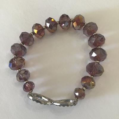 Beautiful faceted light plum crystal/glass bead stretch bracelet