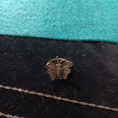 STERLING SILVER RINGS AND CHAIN PLUS A BUTTERFLY RING MARKED 850