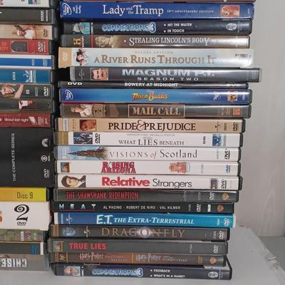 LOT 11: Over 180 DVDs in Various Genres (20 New and Sealed)