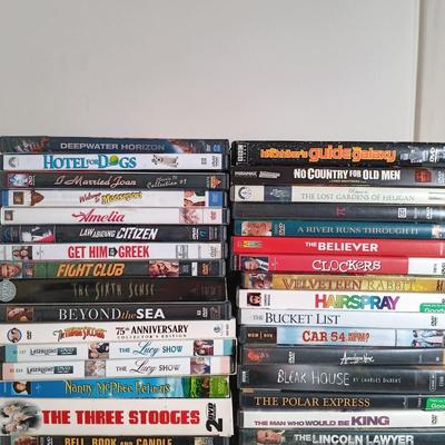 LOT 11: Over 180 DVDs in Various Genres (20 New and Sealed)