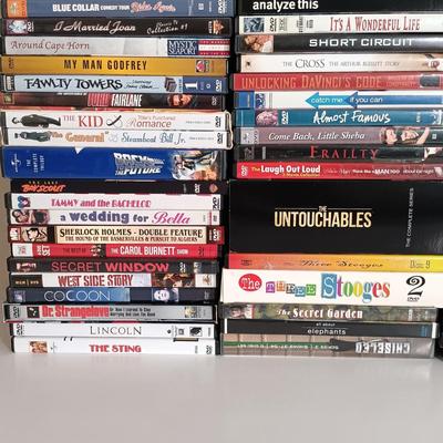 LOT 11: Over 180 DVDs in Various Genres (20 New and Sealed)