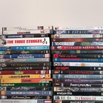 LOT 11: Over 180 DVDs in Various Genres (20 New and Sealed)