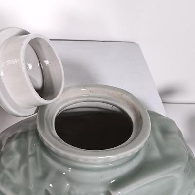 LOT 21: Celadon-Tone Elephant Teapot with Cup, Toyo Peacock Plate, Macau Made Enameled Dish & More