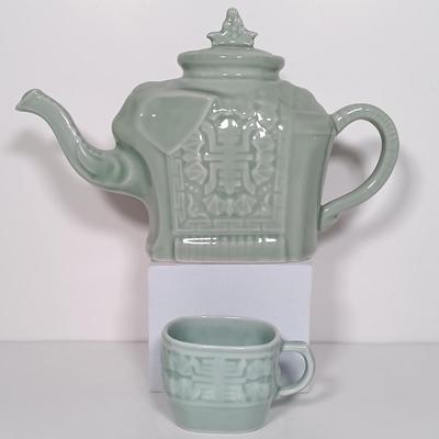 LOT 21: Celadon-Tone Elephant Teapot with Cup, Toyo Peacock Plate, Macau Made Enameled Dish & More