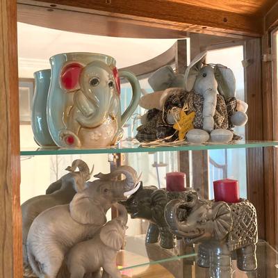 LOT 33: Wall Mount / Hanging Curio Cabinet with Glass Shelves & Doors with Collection of Collectible Elephant Decor
