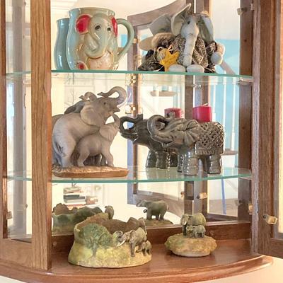 LOT 33: Wall Mount / Hanging Curio Cabinet with Glass Shelves & Doors with Collection of Collectible Elephant Decor