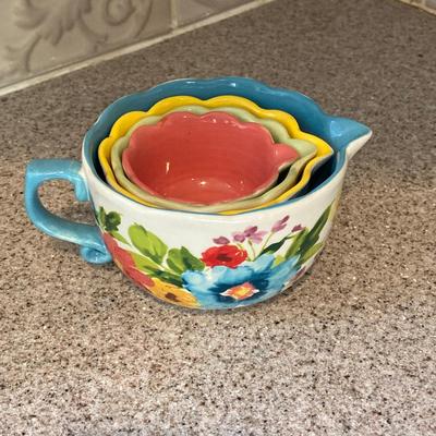 LOT 48: Kitchen Essentials - The Premier Woman Measuring Cups, Mom's Diner Napkin Holder / Butter Dish, Canisters, Towels and More