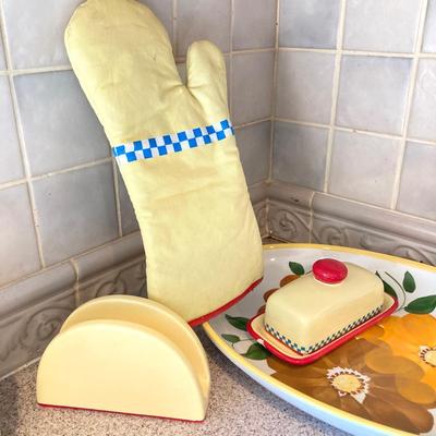 LOT 48: Kitchen Essentials - The Premier Woman Measuring Cups, Mom's Diner Napkin Holder / Butter Dish, Canisters, Towels and More