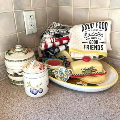 LOT 48: Kitchen Essentials - The Premier Woman Measuring Cups, Mom's Diner Napkin Holder / Butter Dish, Canisters, Towels and More