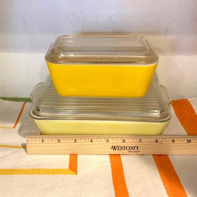 LOT 70: Vintage Pyrex Yellow Refrigerator Dishes with Lids, Cook Books, Tablecloth and Crocheted Pot Holders