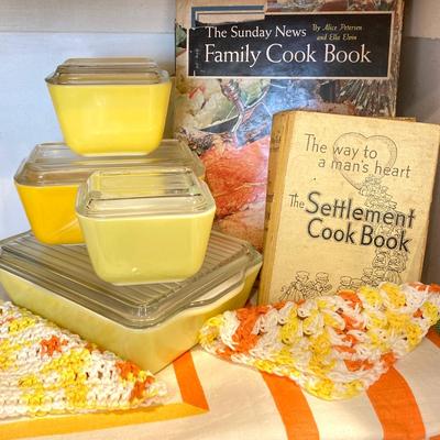 LOT 70: Vintage Pyrex Yellow Refrigerator Dishes with Lids, Cook Books, Tablecloth and Crocheted Pot Holders
