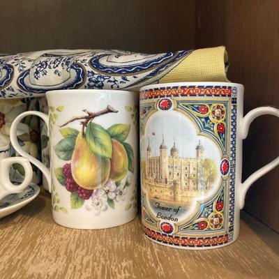 LOT 71: Kitchen Cabinet Tea Time Essentials - Tea Pot, Mugs, Tea Bag Holders, Trivet and More