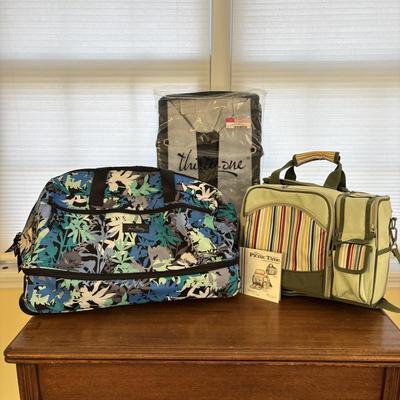 LOT 85: Vera Bradley Rolling Duffle Bag, Thiry-One Buffalo Plaid Deluxe Utility Tote and a Riviera Collection Picnic Tote