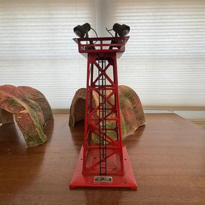 LOT 86: Vintage Plasticville Houses, Paper Mache Train Tunnels, Lionel Whistle Station, Lionel No.395 Flood Light Tower and Accessories