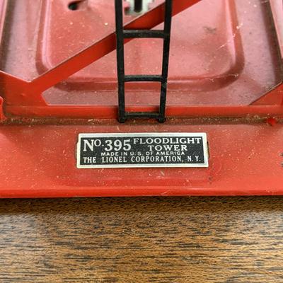 LOT 86: Vintage Plasticville Houses, Paper Mache Train Tunnels, Lionel Whistle Station, Lionel No.395 Flood Light Tower and Accessories