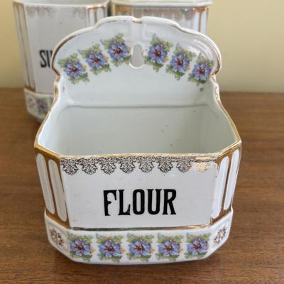 LOT 90: Vintage Porcelain Wall Mounted Salt Cellar & Flour Canister, Sugar & Rice Canisters (missing lid), Allspice & Pepper...