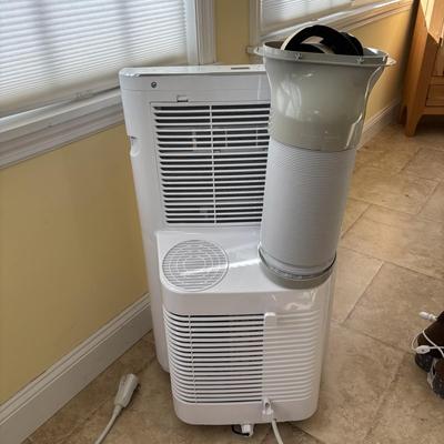 LOT 93: GE Portable Air Conditioner Model APWA14YBMWW1