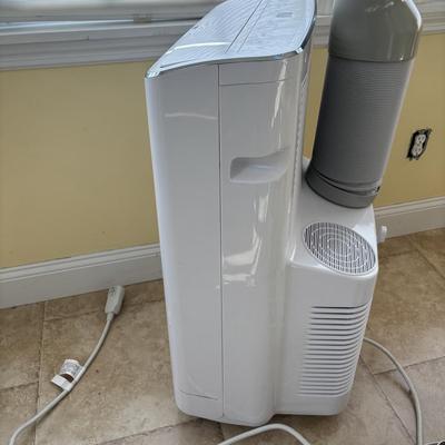 LOT 93: GE Portable Air Conditioner Model APWA14YBMWW1