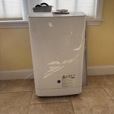 LOT 93: GE Portable Air Conditioner Model APWA14YBMWW1