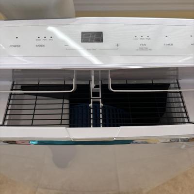 LOT 93: GE Portable Air Conditioner Model APWA14YBMWW1