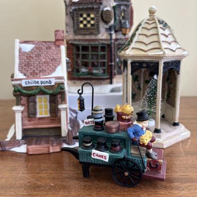 LOT 98: Dept 56 Accessories, Charles Dickens Series Childe Ponde, Cratchit's Corner
