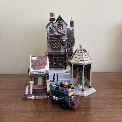 LOT 98: Dept 56 Accessories, Charles Dickens Series Childe Ponde, Cratchit's Corner