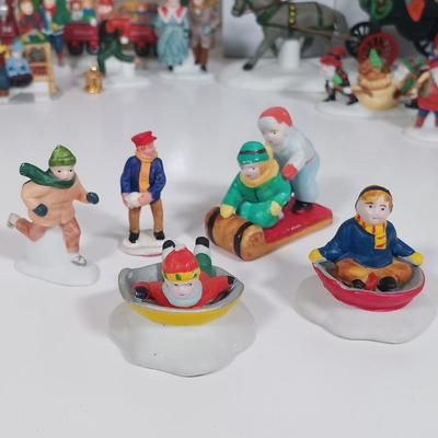 LOT 109: Christmas Village Miniatures - People, Trees and Decor