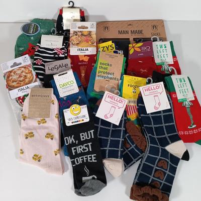 LOT 125: New with Tags Socks with a Collection of Home Goods