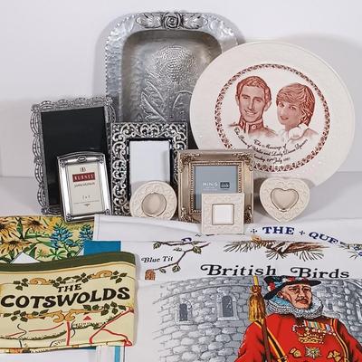 LOT 126: Princess Diana Marriage Plate, UK Themed Dish Towels, Trade Continental Hand Wrought Aluminum & More