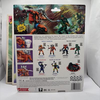 LOT 220: Master of the Universe Snout Spout (NIP), Smokey the Bear & Duck Tale Cardboard Puzzles and a Little Blue Friend Baker Smurf