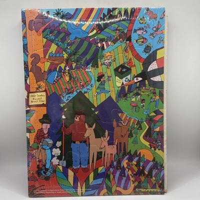 LOT 220: Master of the Universe Snout Spout (NIP), Smokey the Bear & Duck Tale Cardboard Puzzles and a Little Blue Friend Baker Smurf