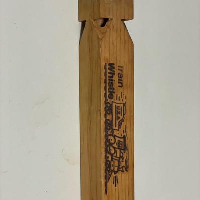 Vintage belt buckles and train whistle