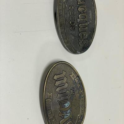 Vintage belt buckles and train whistle