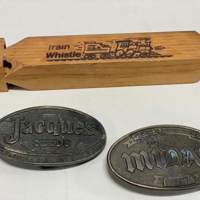 Vintage belt buckles and train whistle