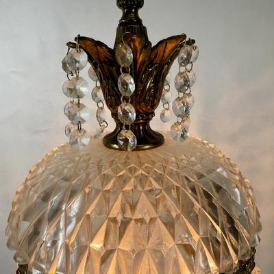 Sale Photo Thumbnail #329: Cast metal bronze-colored base with cherub playing a guitar. Chandelier-style crystal strands make up the shade for the three bulbs inside. Tested, works as expected.