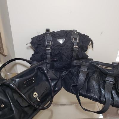 LOT 228MBL: Cole Haan, Prada, Kate Spade Bags