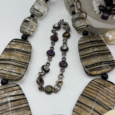 LOT 287J: Collection of Stone Necklaces of Various Lengths