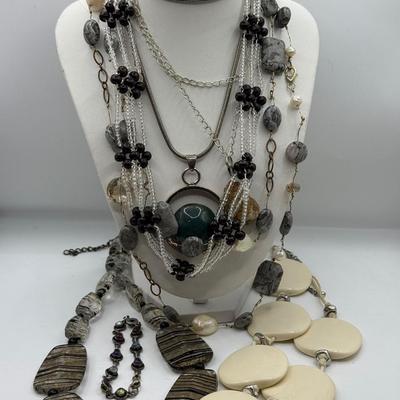 LOT 287J: Collection of Stone Necklaces of Various Lengths