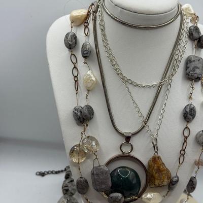 LOT 287J: Collection of Stone Necklaces of Various Lengths