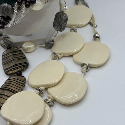 LOT 287J: Collection of Stone Necklaces of Various Lengths