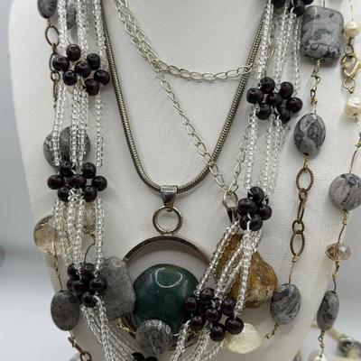 LOT 287J: Collection of Stone Necklaces of Various Lengths