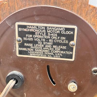 LOT 330: Hamilton Sangamo Synchronous Motor Clock Style S-404, Brass Candle Stick & More