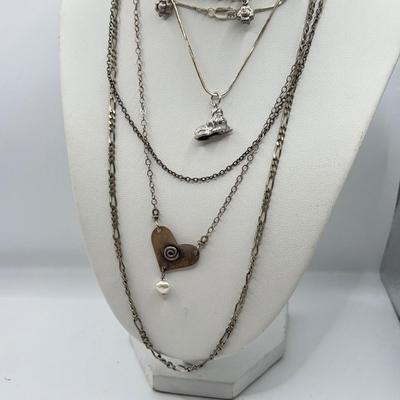 LOT 476J: 925 Sterling Jewelry Collection: Heart, Dog Necklaces (32.94g)
