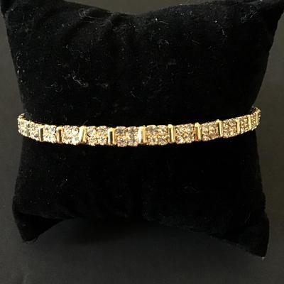 Beautiful, gold tone, rhinestone bangle bracelet