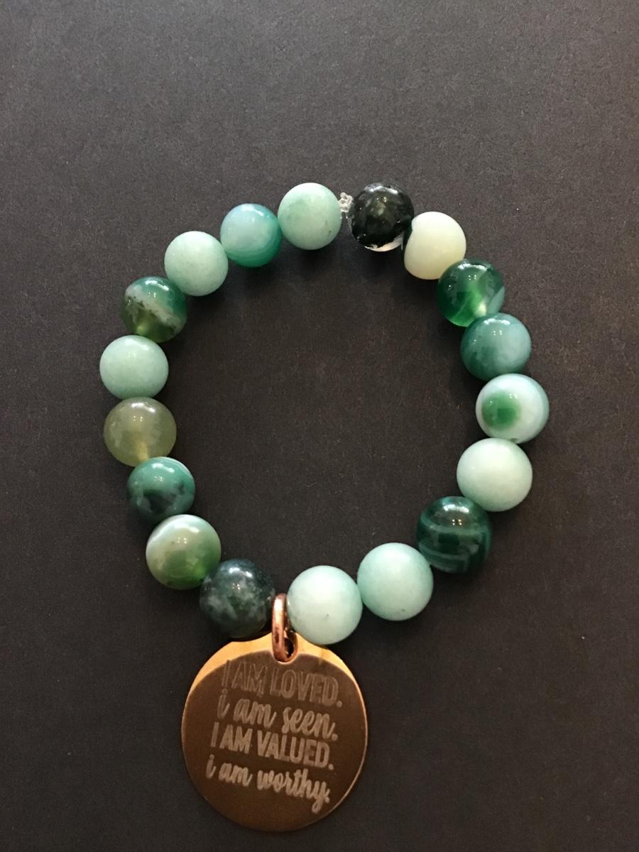 Beautiful, very nice gemstone bead stretch bracelet with charm