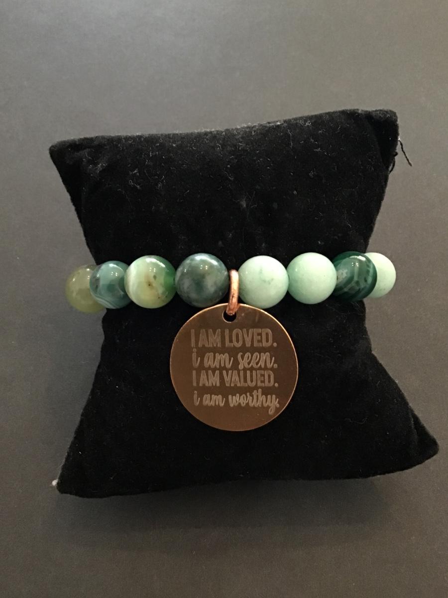 Beautiful, very nice gemstone bead stretch bracelet with charm