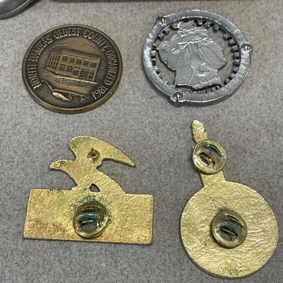 Bottle openers, pins and coins